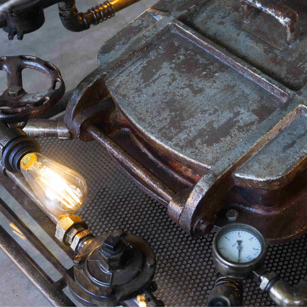 Lowrider industrial table with wood top and salvaged metal base, view 3