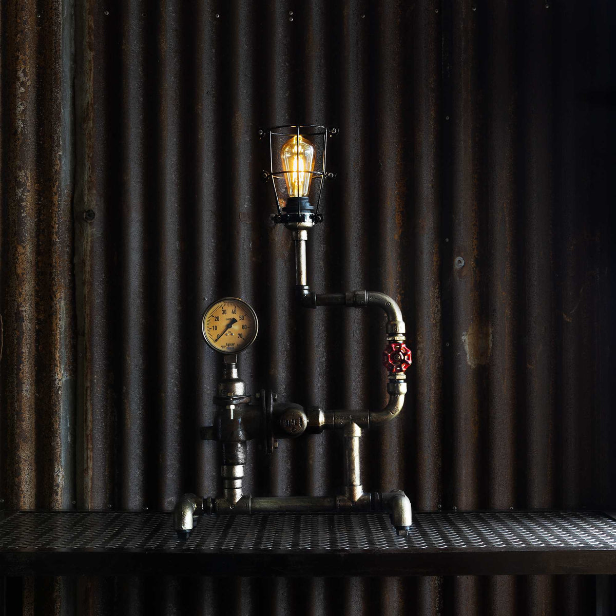 Junction industrial table lamp handmade from reclaimed ship pipes