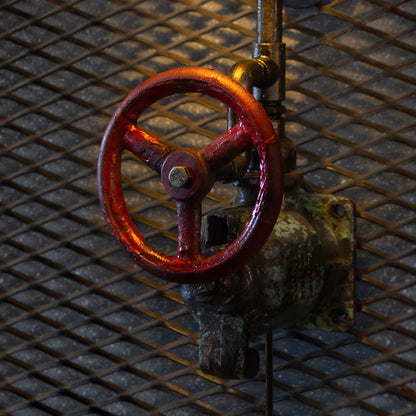 Redwheel industrial wall lamp handmade from reclaimed ship pipes, view 3