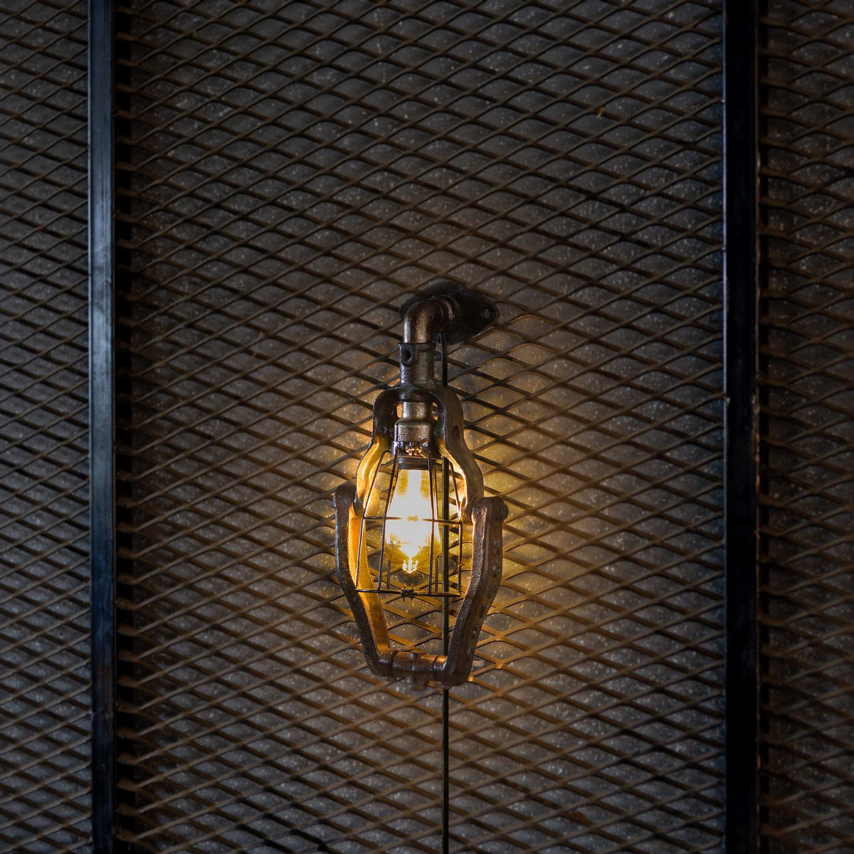 Nomad industrial wall lamp handmade from reclaimed ship pipes
